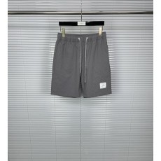 톰브라운 셔커 소재 반팔 셔츠 반바지 세트 001-175038