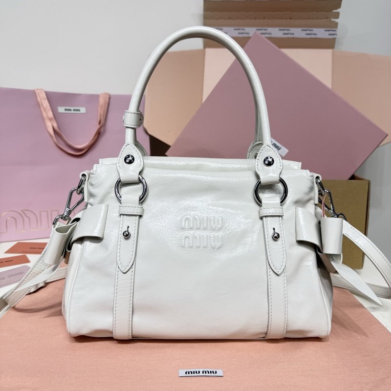 미우미우 복고 오일드 레더 오토바이백 001-248380