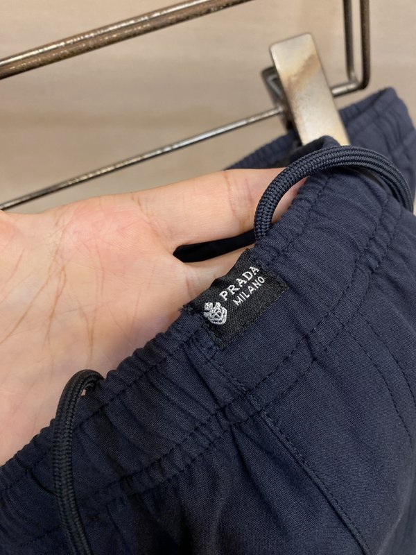 Prada 레터링 라벨 린넨 혼방 면 롱팬츠 001-275490