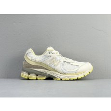화이트 옐로우 뉴발란스 로우컷 런닝화 001-279769