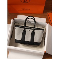 에르메스 가든백 캔버스 블랙 앤 크림 001-282502